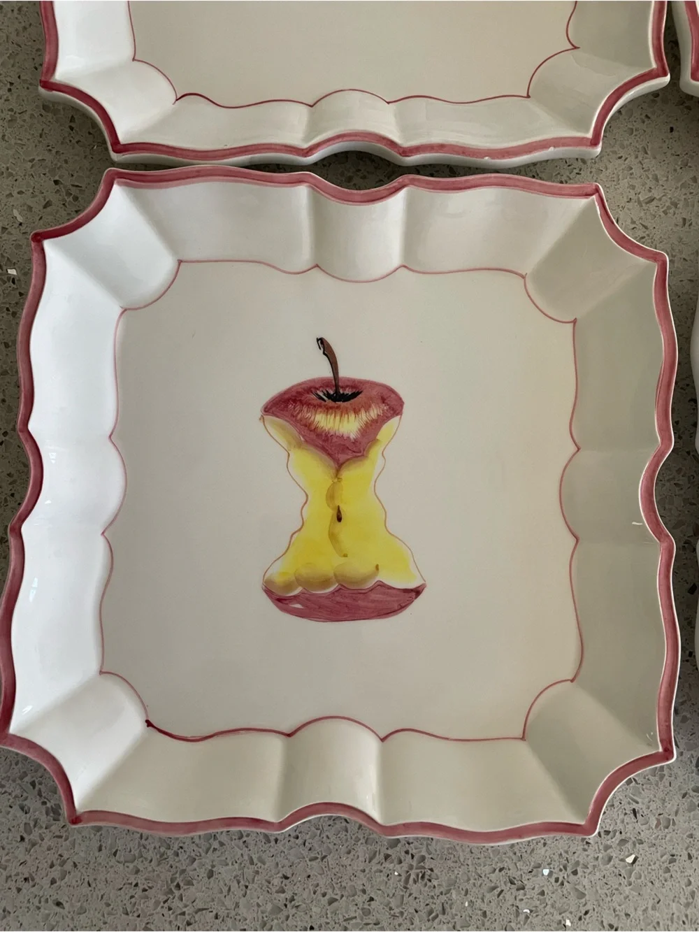 Vietri Dessert Plates or wall decor of disappearing Red Apple Motif and Red Trim